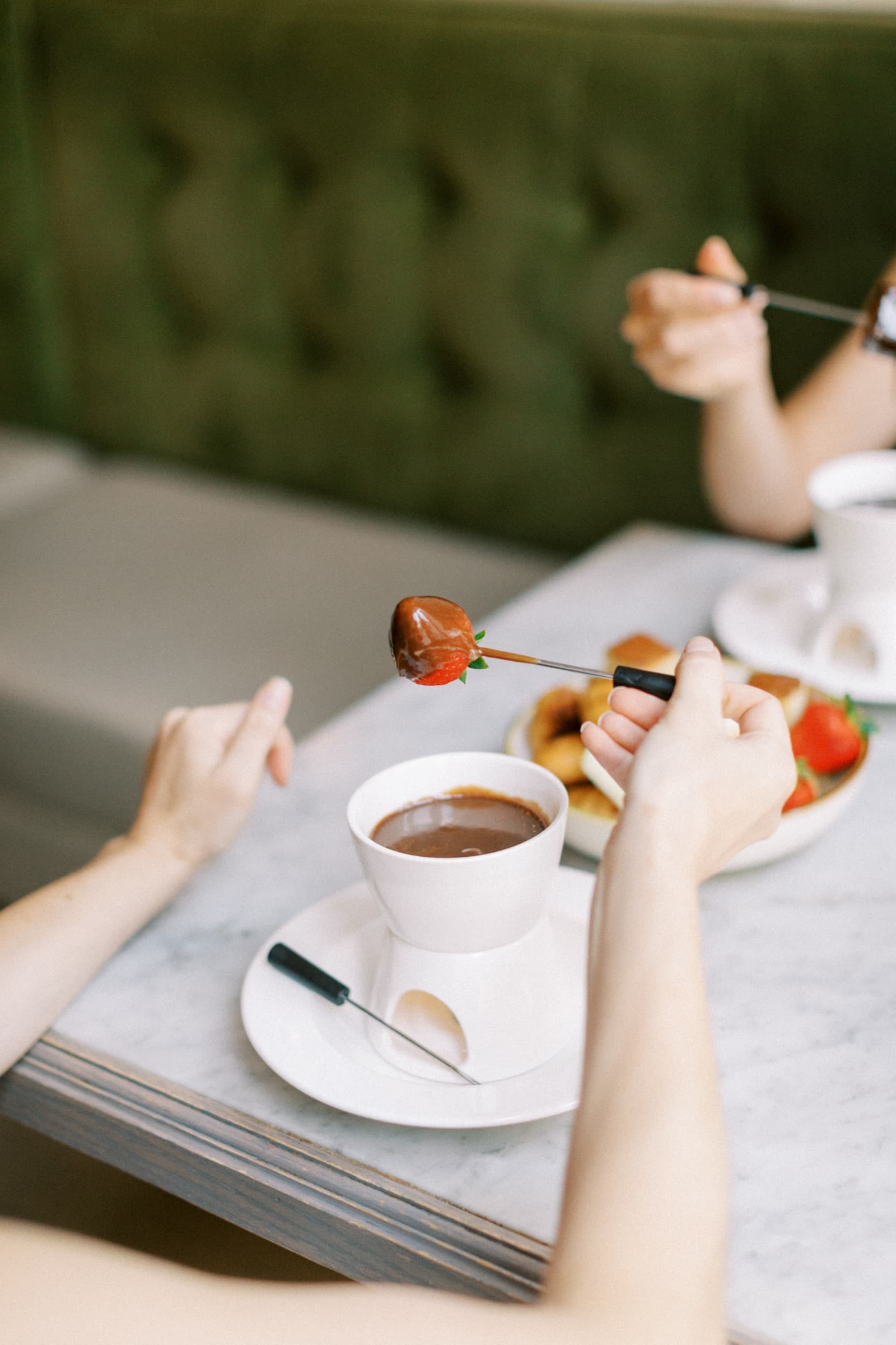 Guests enjoying fondue at The Loon Room